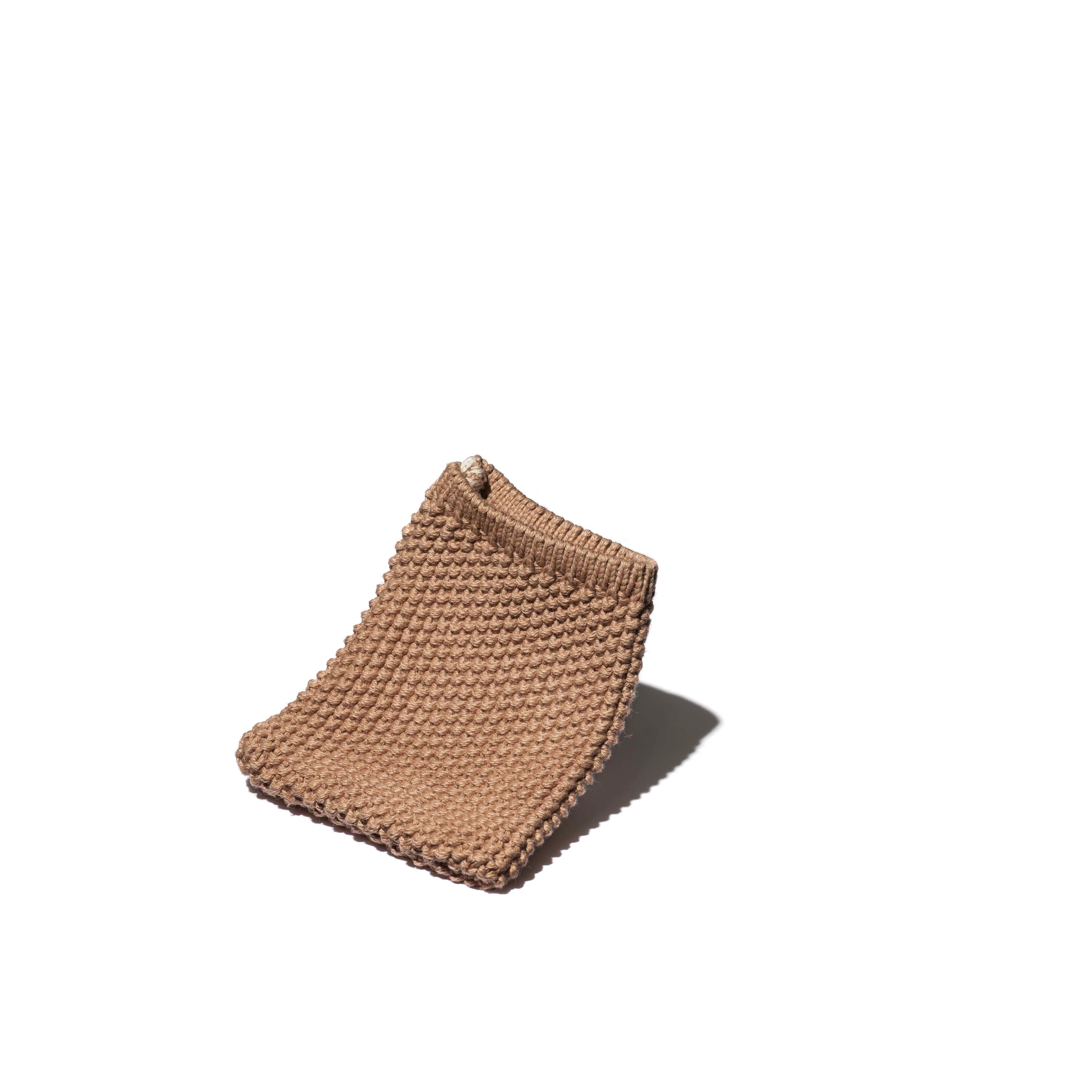 PETIT GANT DE NETTOYAGE POUR VISAGE ORDONNÉ