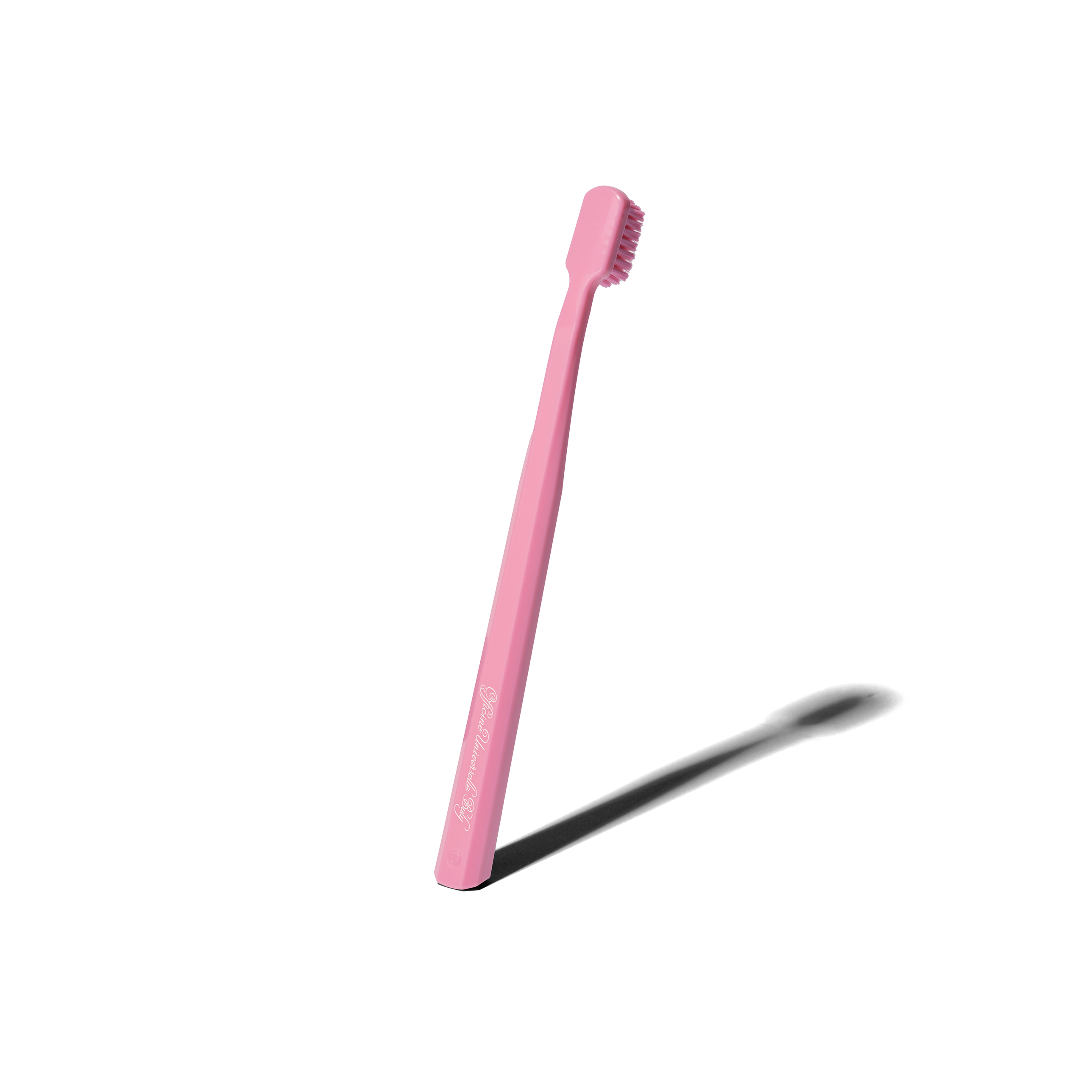 Pink Curaprox toothbrush
